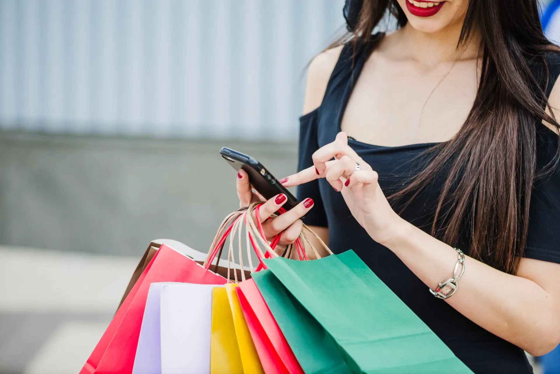 Customer using a smartphone while shopping with loyalty rewards